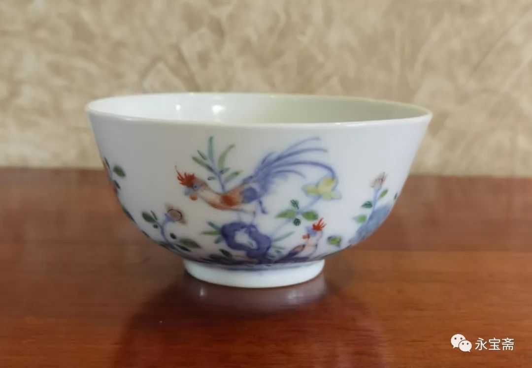 清乾隆款斗彩加彩锦鸡花卉纹碗